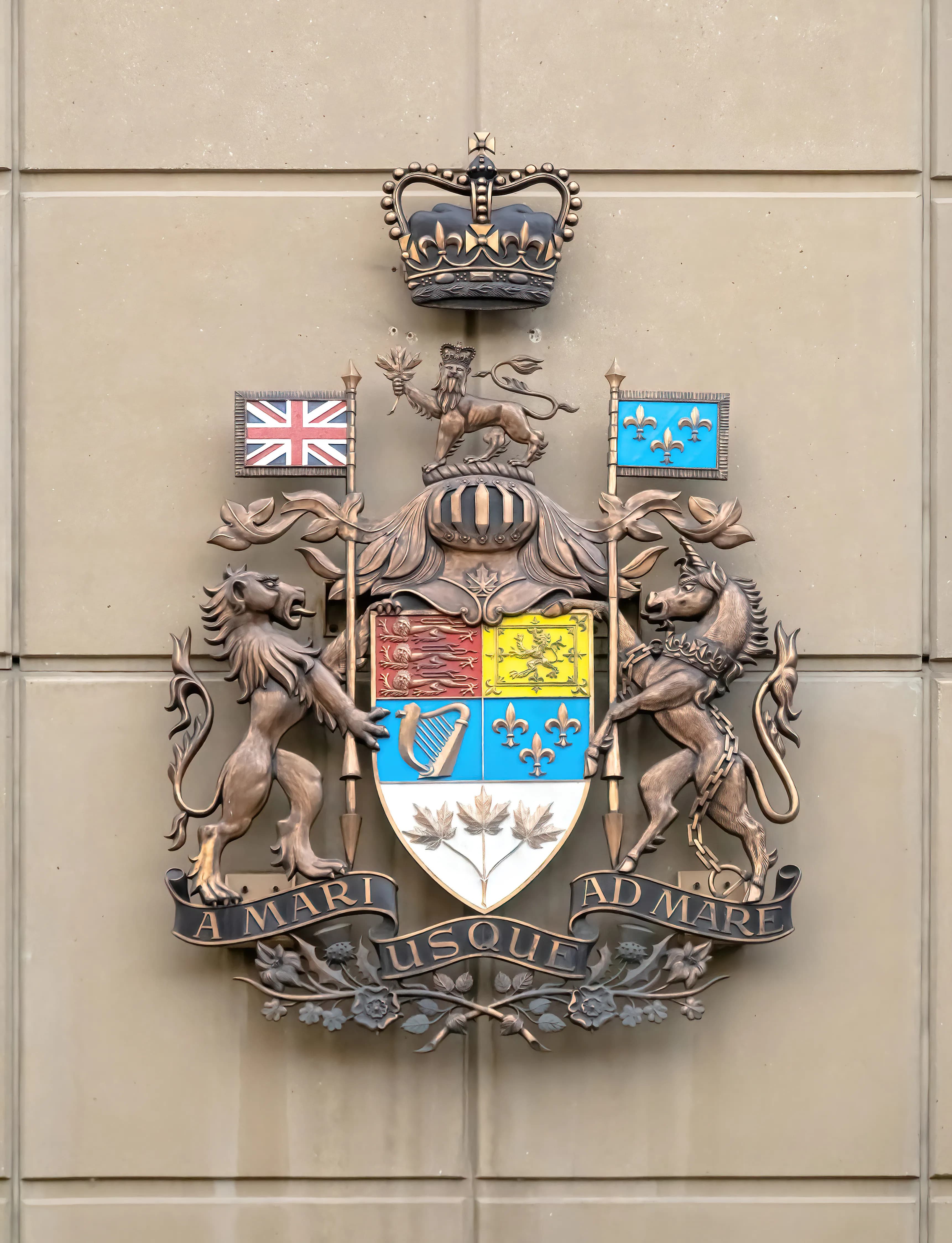 The Royal Coat of Arms of Canada in bronze